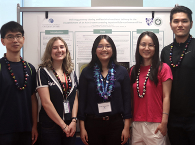 Emily with Chen lab members at the CREATE poster session